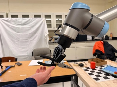 Robotic arm grabbing tool from human hand